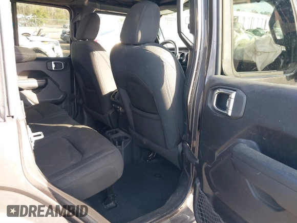 2022 Jeep Wrangler Unlimited Sport with VIN 1C4HJXDG1NW167066, listed as a IAAI auction lot 41572221 with 48,356 mi miles and . Bid and sale history available at DreamBid. Image 8.