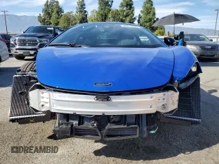 2023 McLaren Artura z VIN SBM16AEA9PW001592, wystawiony jako Copart lot #50613595 z przebiegiem 2956 mil mil oraz Szkody całkowita. Historia ofert i sprzedaży dostępna na DreamBid. Obrazek 5.
