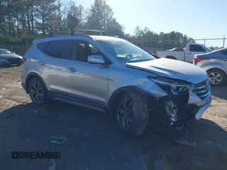 2018 Hyundai Santa Fe Ultimate z VIN 5XYZW4LAXJG554420, wystawiony jako IAAI lot #41628371 z przebiegiem 65 436 mil mil oraz . Historia ofert i sprzedaży dostępna na DreamBid. Obrazek 1.