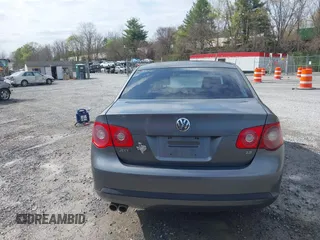 2005 Volkswagen Jetta Sedan 2.5L with VIN 3VWSG71K35M617763, listed as a IAAI auction lot 41963065 with 200,915 mi miles. Bid and sale history available at carsss.com. Image 16.