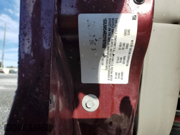 2002 Saturn LS z VIN 1G8JW54R22Y575062, wystawiony jako Copart lot #42009225 z przebiegiem Nie podano mil oraz Nie do naprawy. Historia ofert i sprzedaży dostępna na DreamBid. Obrazek 12.