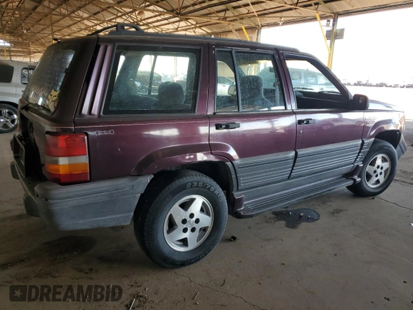 1995 Jeep Grand Cherokee Laredo with VIN 1J4GZ58S1SC704775, listed as a Copart auction lot 87556535 with 266,365 mi miles and Salvage title. Bid and sale history available at DreamBid. Image 3.