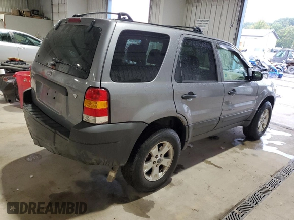 2007 Ford Escape XLT with VIN 1FMYU93107KA67692, listed as a Copart auction lot 72799184 with 230,668 mi miles and Salvage Title. Bid and sale history available at carsss.com. Image 3.