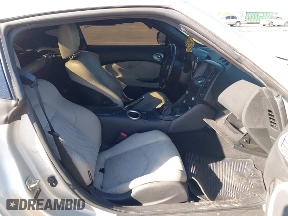 2014 Nissan 370Z Nismo with VIN JN1AZ4EHXEM634418, listed as a IAAI auction lot 41308580 with 84,074 mi miles and . Bid and sale history available at DreamBid. Image 8.