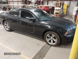 2011 Dodge Charger RT Plus with VIN 2B3CL5CT9BH511648, listed as a IAAI auction lot 41734392 with 103,112 mi miles. Bid and sale history available at carsss.com. Image 1.