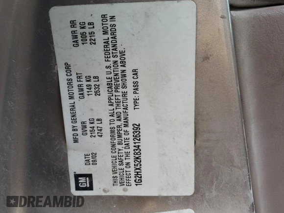 2003 Pontiac Bonneville SE z VIN 1G2HX52K834126392, wystawiony jako Copart lot #43009704 z przebiegiem 231 223 mil mil oraz Szkoda całkowita • Salvage title. Historia ofert i sprzedaży dostępna na DreamBid. Obrazek 15.