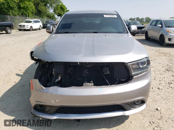2014 Dodge Durango SXT z VIN 1C4RDJAG8EC455892, wystawiony jako Copart lot #57796095 z przebiegiem 98 251 mil mil oraz Szkoda całkowita • Salvage title. Historia ofert i sprzedaży dostępna na DreamBid. Obrazek 5.
