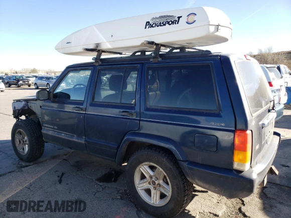 2000 Jeep Cherokee Limited with VIN 1J4FF68S0YL250926, listed as a Copart auction lot 84837244 with 141,020 mi miles and Salvage Title. Bid and sale history available at carsss.com. Image 2.