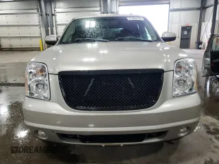 2007 GMC Yukon Denali z VIN 1GKFK638X7J151025, wystawiony jako Copart lot #57663755 z przebiegiem 229 754 mil mil oraz Tytuł czysty. Historia ofert i sprzedaży dostępna na DreamBid. Obrazek 5.