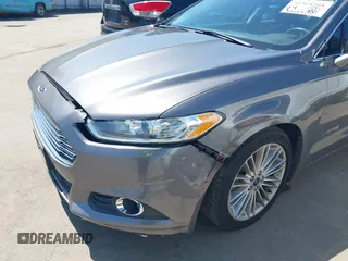 2014 Ford Fusion SE Hybrid with VIN 3FA6P0LU9ER142204, listed as a IAAI auction lot 41964308 with 177,499 mi miles. Bid and sale history available at carsss.com. Image 12.