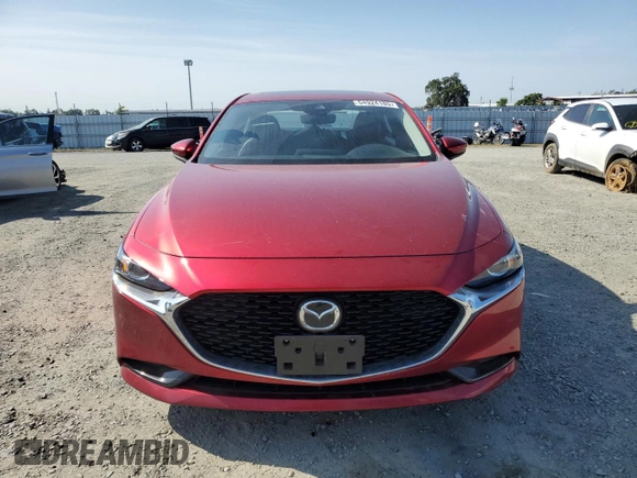 2022 Mazda 3 Carbon Edition z VIN JM1BPACL2N1506916, wystawiony jako Copart lot #54924185 z przebiegiem 71 622 mil mil oraz Szkoda całkowita • Salvage title. Historia ofert i sprzedaży dostępna na DreamBid. Obrazek 5.