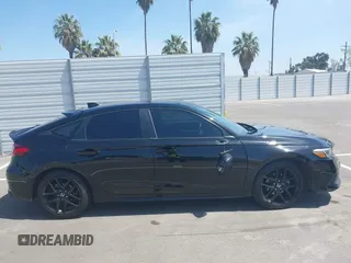 2023 Honda Civic Sport with VIN 19XFL2H84PE001354, listed as a IAAI auction lot 42053691 with 34,127 mi miles and . Bid and sale history available at DreamBid. Image 13.