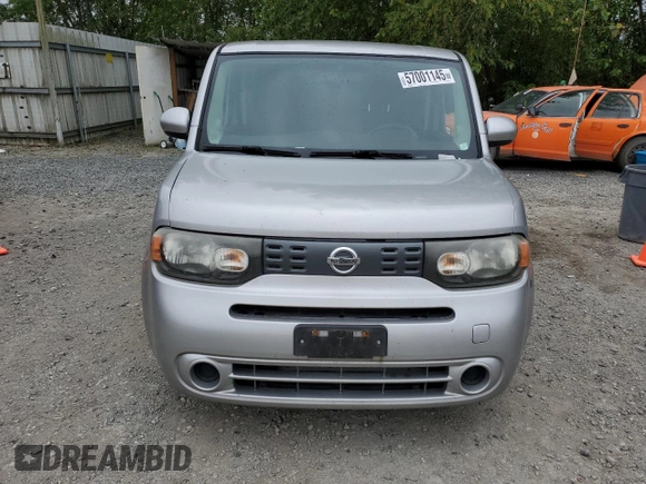 2011 Nissan Cube S z VIN JN8AZ2KR7BT203409, wystawiony jako Copart lot #57001145 z przebiegiem 127 446 mil mil oraz Tytuł czysty. Historia ofert i sprzedaży dostępna na DreamBid. Obrazek 5.
