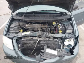 2005 Dodge Caravan SXT with VIN 2D4GP44LX5R115310, listed as a IAAI auction lot 41668454 with 115,784 mi miles and . Bid and sale history available at DreamBid. Image 10.