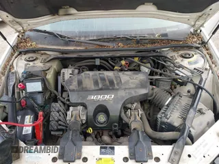 2001 Chevrolet Impala LS z VIN 2G1WH55K419267149, wystawiony jako IAAI lot #42125294 z przebiegiem 116 852 mil mil oraz . Historia ofert i sprzedaży dostępna na DreamBid. Obrazek 10.