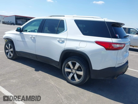 2018 Chevrolet Traverse LT z VIN 1GNEVHKW3JJ125861, wystawiony jako IAAI lot #41876184 z przebiegiem 95 223 mil mil oraz . Historia ofert i sprzedaży dostępna na DreamBid. Obrazek 3.