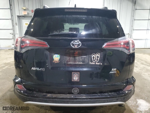 2016 Toyota RAV4 SE with VIN 2T3JFREV8GW457141, listed as a Copart auction lot 46849385 with 103,901 mi miles and Salvage Title. Bid and sale history available at carsss.com. Image 6.