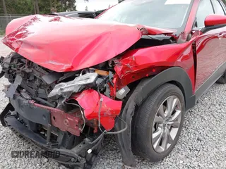2021 Mazda CX-30 Premium with VIN 3MVDMBDM7MM213754, listed as a IAAI auction lot 42509691 with 61,230 mi miles and . Bid and sale history available at DreamBid. Image 6.