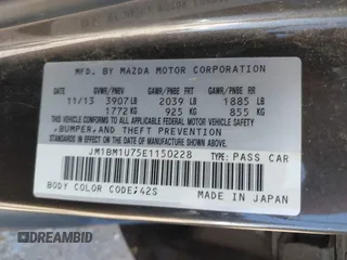 2014 Mazda 3 i Sport with VIN JM1BM1U75E1150228, listed as a IAAI auction lot 41984077 with 85,471 mi miles and . Bid and sale history available at carsss.com. Image 9.