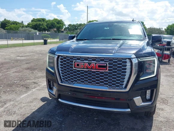 2021 GMC Yukon Denali with VIN 1GKS2DKL7MR471280, listed as a IAAI auction lot 40189766 with 126,591 mi miles. Bid and sale history available at carsss.com. Image 12.
