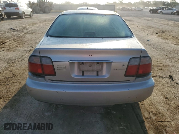 1997 Honda Accord Value with VIN 1HGCD5684VA168495, listed as a Copart auction lot 71716984 with 202,854 mi miles and Salvage Title. Bid and sale history available at DreamBid. Image 6.