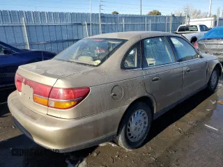 2001 Saturn LS z VIN 1G8JU52FX1Y552416, wystawiony jako Copart lot #41967165 z przebiegiem 196 403 mil mil oraz Szkody całkowita. Historia ofert i sprzedaży dostępna na DreamBid. Obrazek 3.