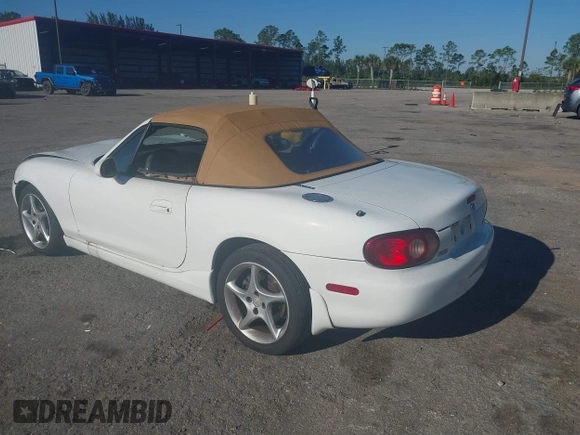 2003 Mazda MX-5 Miata Cloth z VIN JM1NB353730312566, wystawiony jako IAAI lot #41782864 z przebiegiem Nie podano mil oraz . Historia ofert i sprzedaży dostępna na DreamBid. Obrazek 3.