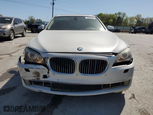 2011 BMW 7 Series 740i with VIN WBAKA4C50BC612878, listed as a Copart auction lot 52035635 with 192,248 mi miles and Salvage Title. Bid and sale history available at carsss.com. Image 5.