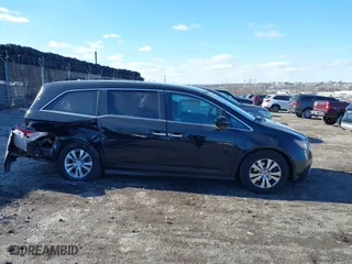 2016 Honda Odyssey SE with VIN 5FNRL5H34GB139571, listed as a IAAI auction lot 41602695 with 118,960 mi miles. Bid and sale history available at carsss.com. Image 13.