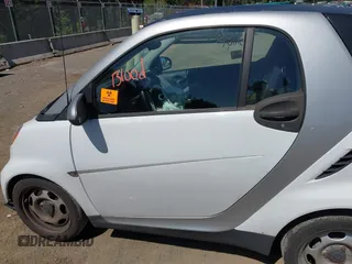 2012 Smart fortwo Pure z VIN WMEEJ3BAXCK563660, wystawiony jako IAAI lot #42165195 z przebiegiem 53 809 mil mil oraz . Historia ofert i sprzedaży dostępna na DreamBid. Obrazek 15.