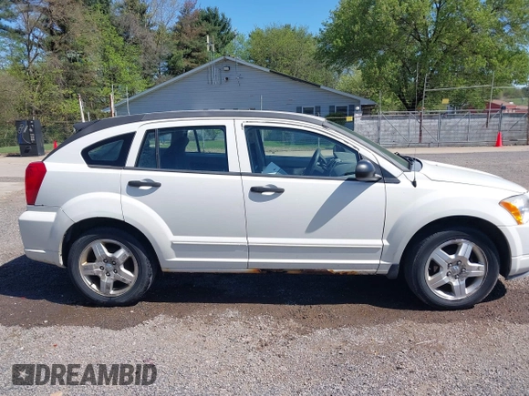 2007 Dodge Caliber SXT with VIN 1B3HB48BX7D160420, listed as a IAAI auction lot 42133771 with 169,796 mi miles and . Bid and sale history available at DreamBid. Image 14.