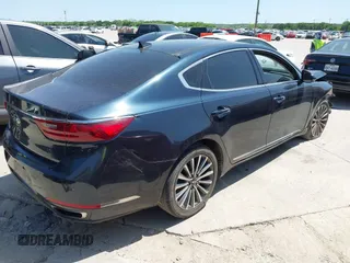 2017 Kia Cadenza Premium with VIN KNALC4J14H5041469, listed as a IAAI auction lot 42021353 with 127,081 mi miles. Bid and sale history available at carsss.com. Image 4.