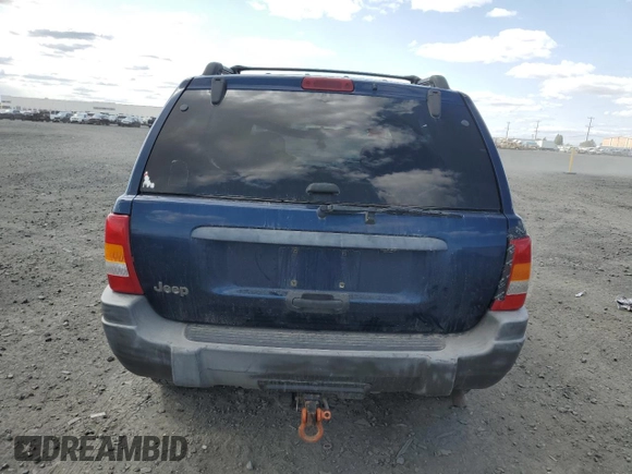 2000 Jeep Grand Cherokee Laredo z VIN 1J4GW48S2YC154627, wystawiony jako Copart lot #54173315 z przebiegiem 251 666 mil mil oraz Szkoda całkowita • Salvage title. Historia ofert i sprzedaży dostępna na DreamBid. Obrazek 6.