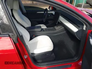 2023 Tesla Model Y Performance with VIN 7SAYGDEF6PF870935, listed as a IAAI auction lot 40718563 with 15,286 mi miles and . Bid and sale history available at DreamBid. Image 5.