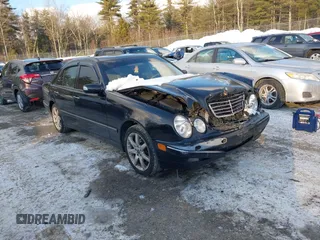2001 Mercedes-Benz E-Class AWD with VIN WDBJF83J81X052618, listed as a IAAI auction lot 41391288 with 120,895 mi miles. Bid and sale history available at carsss.com. Image 1.