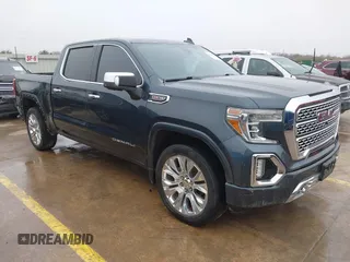 2020 GMC Sierra 1500 Denali z VIN 1GTU9FEL1LZ120581, wystawiony jako IAAI lot #41428827 z przebiegiem 97 917 mil mil oraz . Historia ofert i sprzedaży dostępna na DreamBid. Obrazek 1.