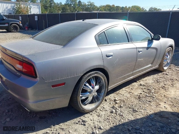 2014 Dodge Charger SXT with VIN 2C3CDXHG5EH234377, listed as a IAAI auction lot 40665498 with 116755 miles. Bid and sale history available at carsss.com. Image 4.
