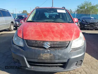 2008 Suzuki SX4 Regional Edition z VIN JS2YA413585103516, wystawiony jako IAAI lot #41858485 z przebiegiem 164 337 mil mil oraz . Historia ofert i sprzedaży dostępna na DreamBid. Obrazek 6.