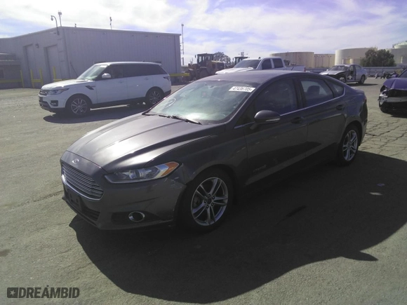 2015 Ford Fusion SE Hybrid with VIN 3FA6P0LU7FR215801, listed as a Copart auction lot 47436705 with 124,568 mi miles and Salvage Title. Bid and sale history available at carsss.com. Image 1.