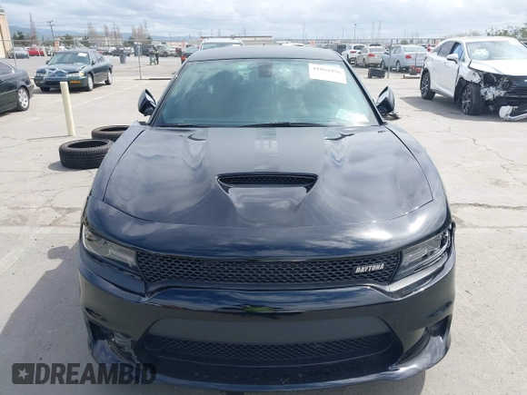 2021 Dodge Charger R/T with VIN 2C3CDXCT4MH651945, listed as a IAAI auction lot 41861896 with 25,569 mi miles and . Bid and sale history available at carsss.com. Image 12.