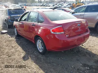 2009 Ford Focus SE with VIN 1FAHP35N89W188335, listed as a IAAI auction lot 41800622 with 164,176 mi miles. Bid and sale history available at carsss.com. Image 3.