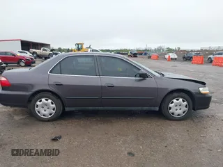 1999 Honda Accord LX with VIN 1HGCG5647XA154131, listed as a IAAI auction lot 41962701 with 126,673 mi miles and . Bid and sale history available at DreamBid. Image 13.