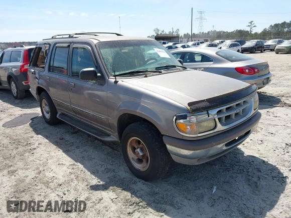 1996 Ford Explorer XL z VIN 1FMDU34XXTUD00720, wystawiony jako IAAI lot #41881522 z przebiegiem 156 194 mil mil oraz . Historia ofert i sprzedaży dostępna na DreamBid. Obrazek 1.