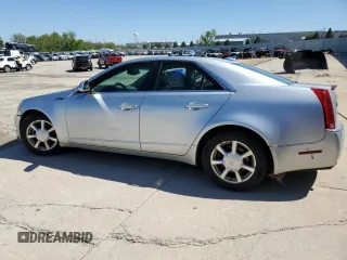 2009 Cadillac CTS AWD with VIN 1G6DG577690170912, listed as a Copart auction lot 56020815 with 142,932 mi miles and Clean Title. Bid and sale history available at DreamBid. Image 2.