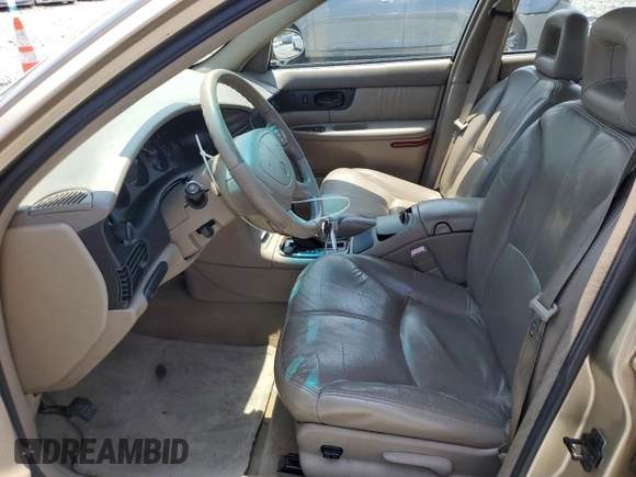 2004 Buick Regal LS with VIN 2G4WB52K641229837, listed as a Copart auction lot 57838905 with 214,406 mi miles and Salvage title. Bid and sale history available at DreamBid. Image 7.