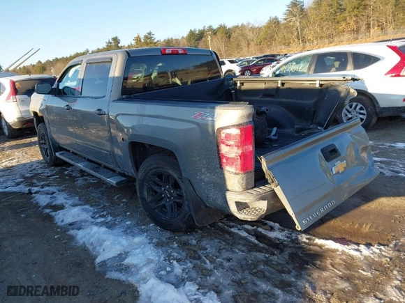 2017 Chevrolet Silverado 1500 LT with VIN 3GCUKREC2HG341135, listed as a IAAI auction lot 41464078 with 113,676 mi miles. Bid and sale history available at carsss.com. Image 3.