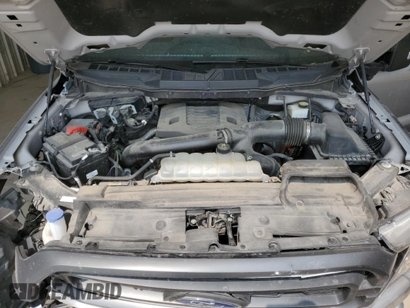 2021 Ford F-150 XL with VIN 1FTFW1E85MKE03933, listed as a Copart auction lot 60513185 with 82,793 mi miles and Salvage title. Bid and sale history available at DreamBid. Image 11.