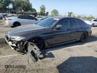 2022 BMW 5 Series M550i xDrive z VIN WBA13BK03NCK95022, wystawiony jako Copart lot #58600105 z przebiegiem 34 142 mil mil oraz Szkoda całkowita • Salvage title. Historia ofert i sprzedaży dostępna na DreamBid. Obrazek 1.