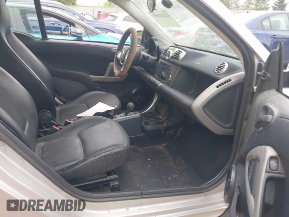 2014 Smart fortwo Pure with VIN WMEEJ3BA5EK749285, listed as a IAAI auction lot 42231893 with 119,507 mi miles and . Bid and sale history available at DreamBid. Image 5.