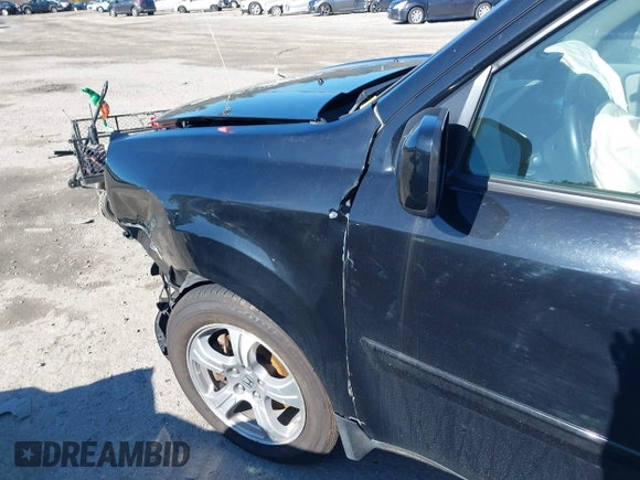 2013 Honda Pilot EX-L with VIN 5FNYF4H5XDB042112, listed as a IAAI auction lot 41989208 with 66,925 mi miles and . Bid and sale history available at DreamBid. Image 6.